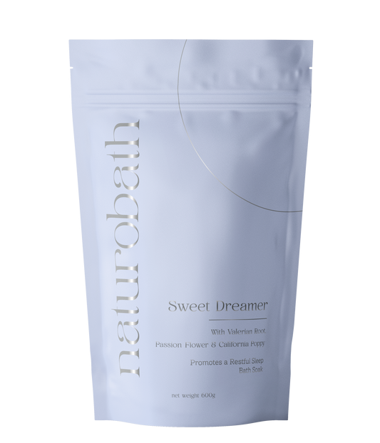 Sweet Dreamer Nighttime Bath Soak with valerian root, passionflower, and magnesium in minimalist clean beauty packaging