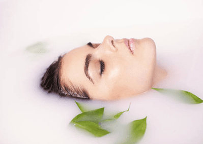 Milk Bath Benefits: What's Real, What's Myth, and How To Soak