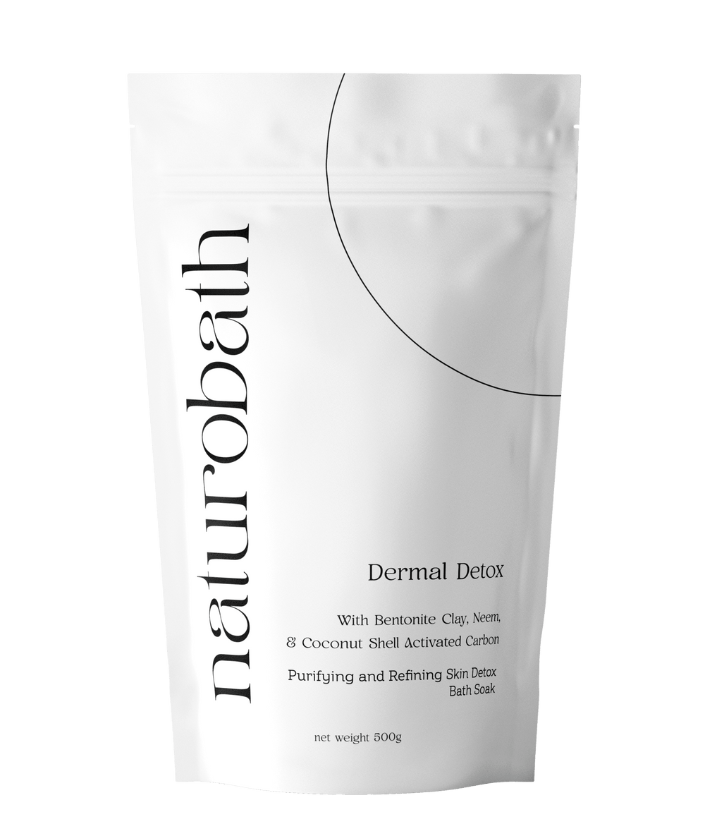Dermal Detox charcoal bath soak with Neem and Bentonite Clay to adsorb urban pollutants and clear acne bacteria.