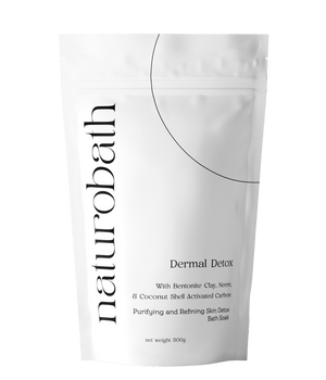 Dermal Detox charcoal bath soak with Neem and Bentonite Clay to adsorb urban pollutants and clear acne bacteria.
