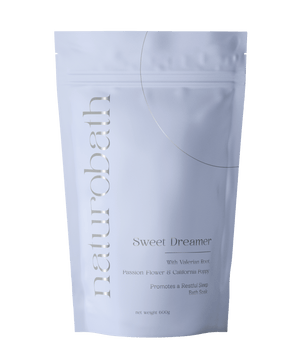 Sweet Dreamer mineral soak, infused with a calming, aromatic blend for your evening wind-down